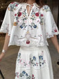 Embroidered Floral Hollow Out Tied Loose Round Neck Puff Sleeve Top